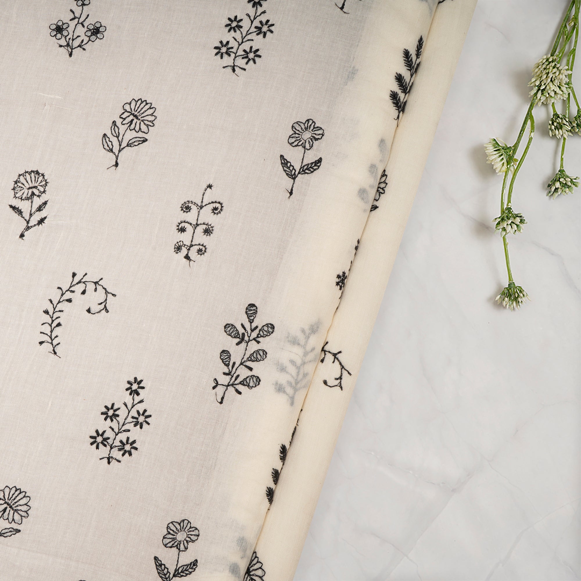 (Pre Cut 1 Mtr ) Cream-Black Color Embroidered Cotton Voile Fabric