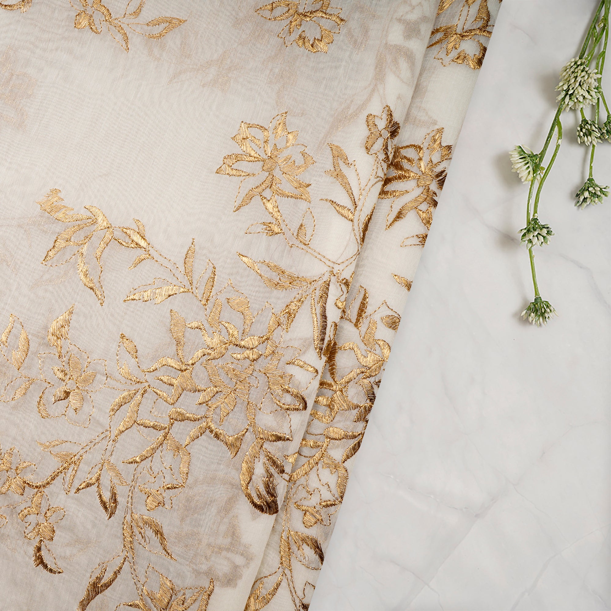(Pre-Cut 0.50 Mtr)Off-White-Gold Dyeable All Over Floral Pattern Thread Embroidered Chanderi Fabric