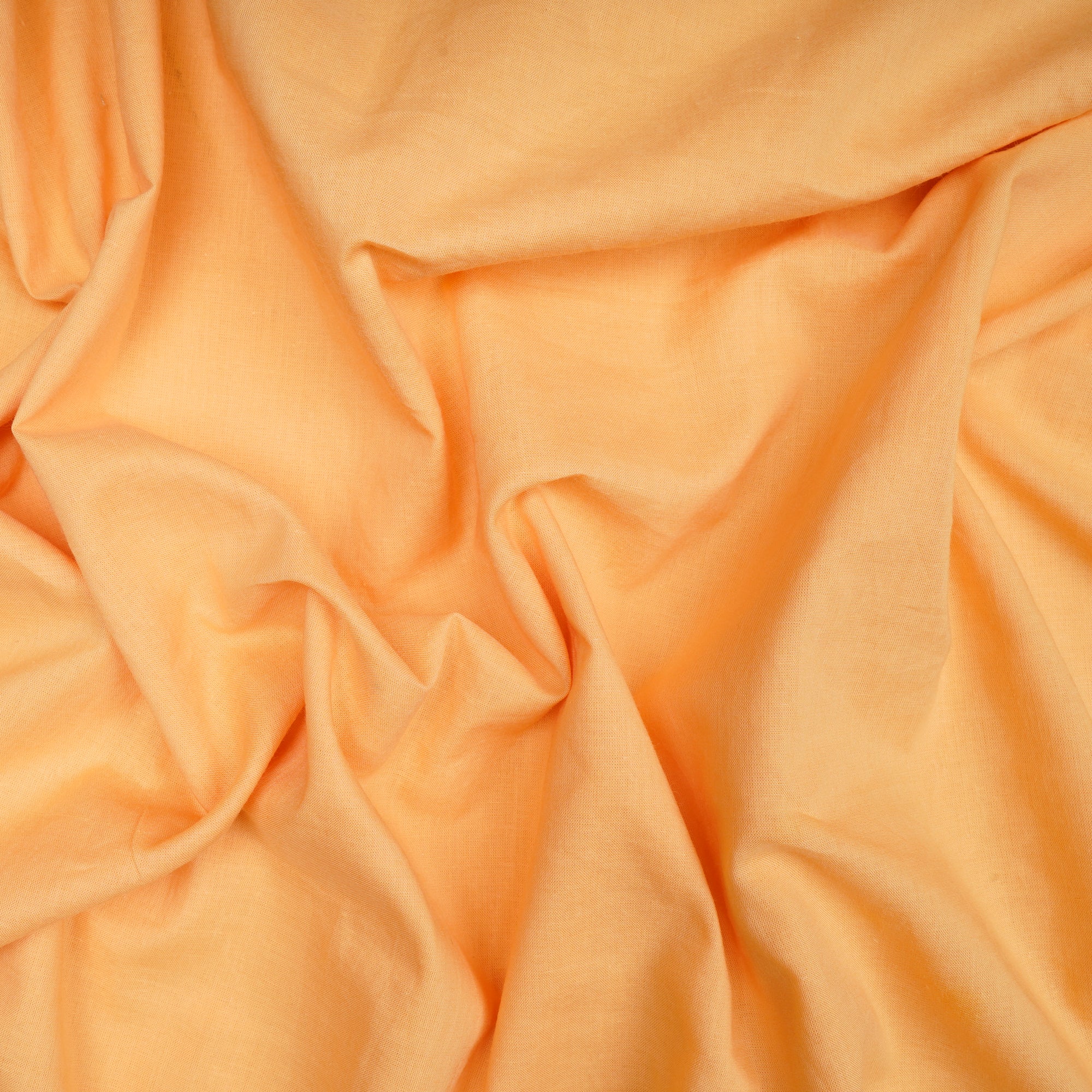 Pastel Orange Piece Dyed Cotton Cambric Fabric