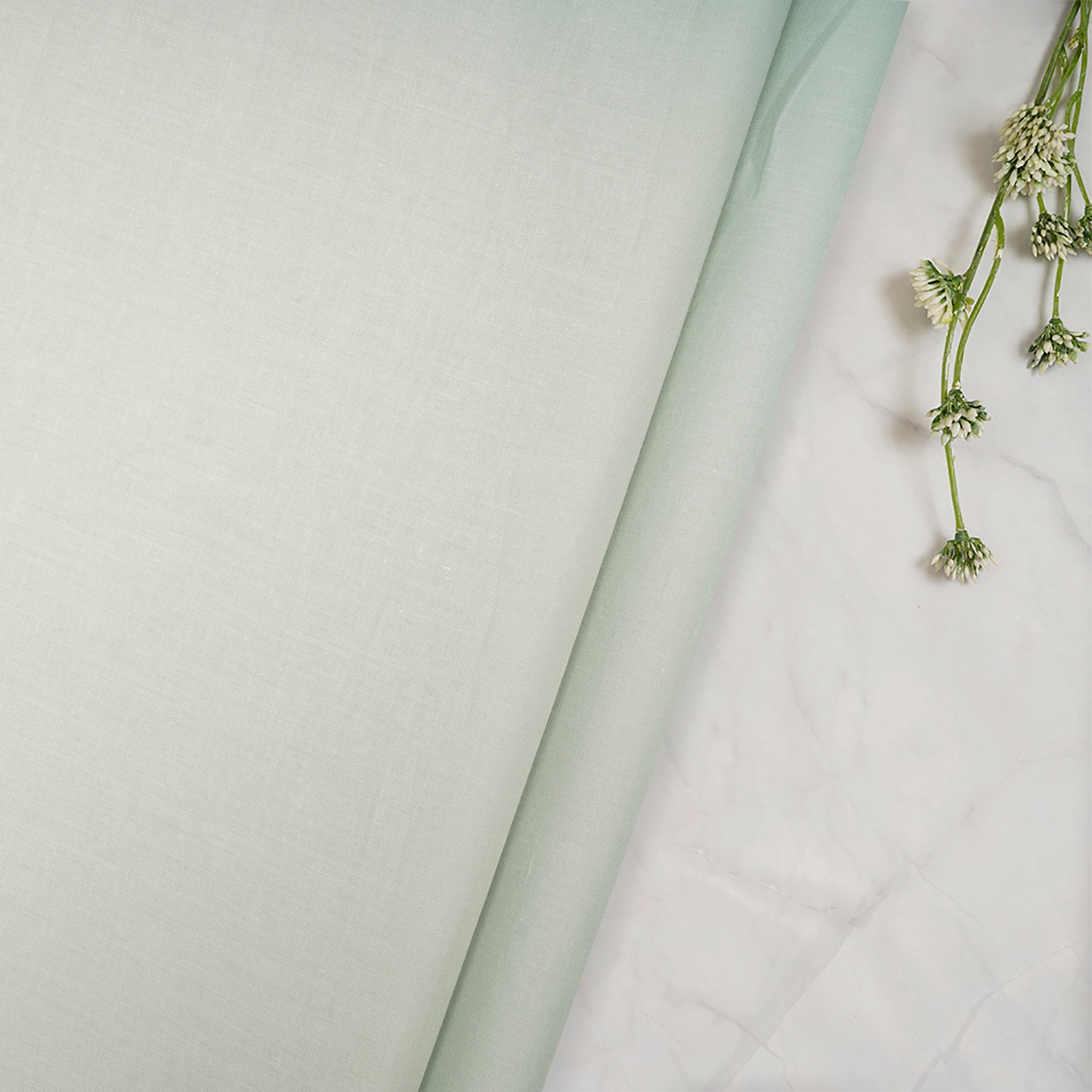 Pastel Green Piece Dyed Cotton Cambric Fabric