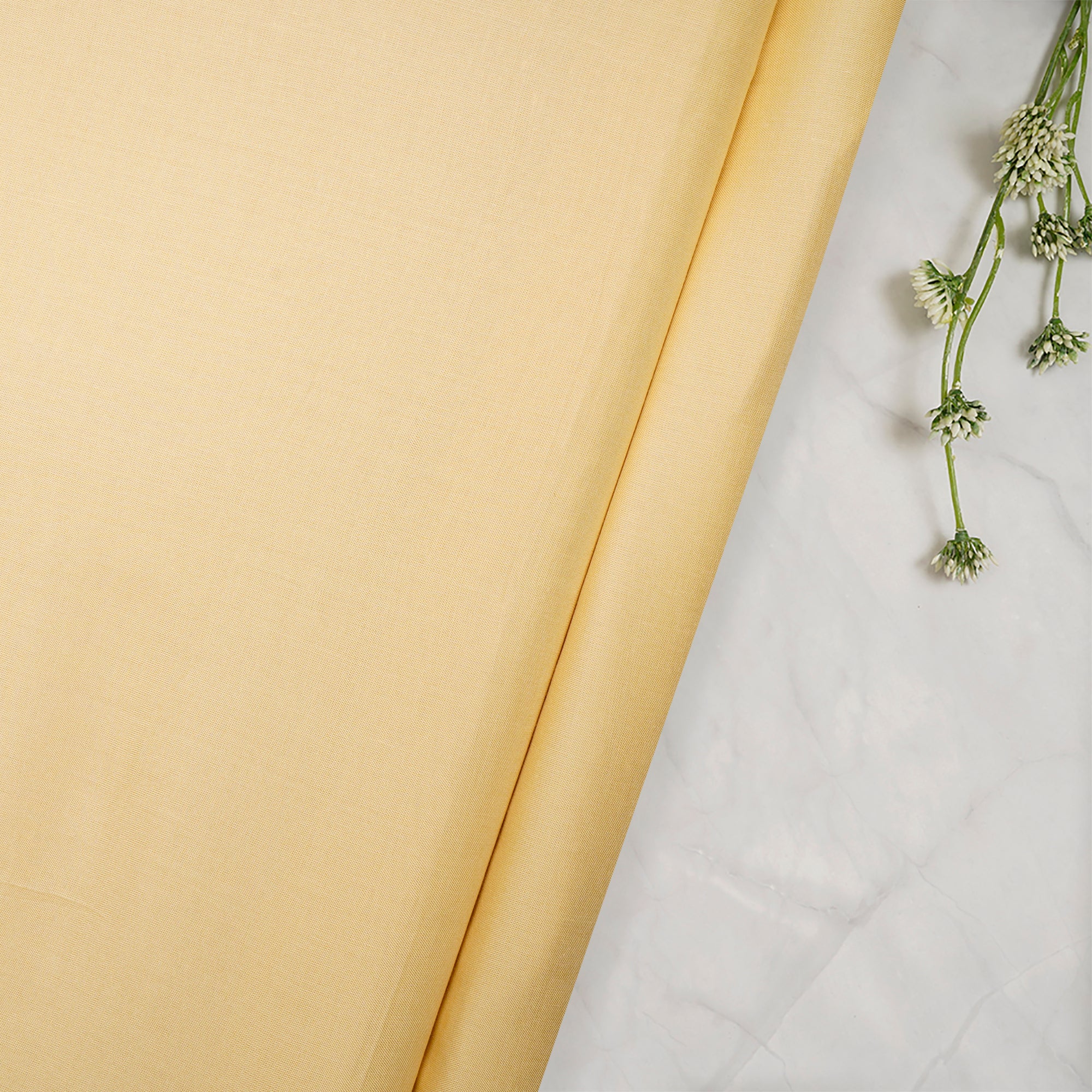 Powder Yellow Piece Dyed Plain Modal Fabric