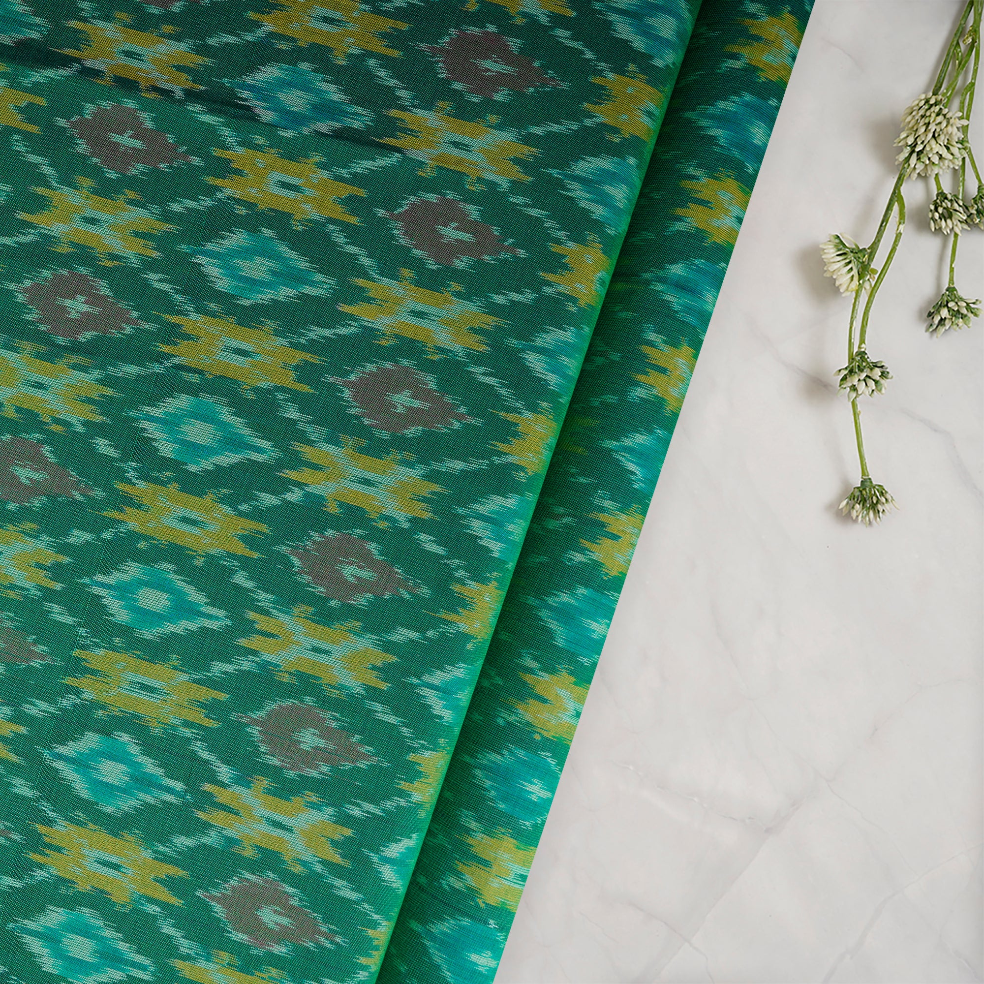 Dark Green Handwoven Pure Silk-Cotton (Sico) Ikat Fabric