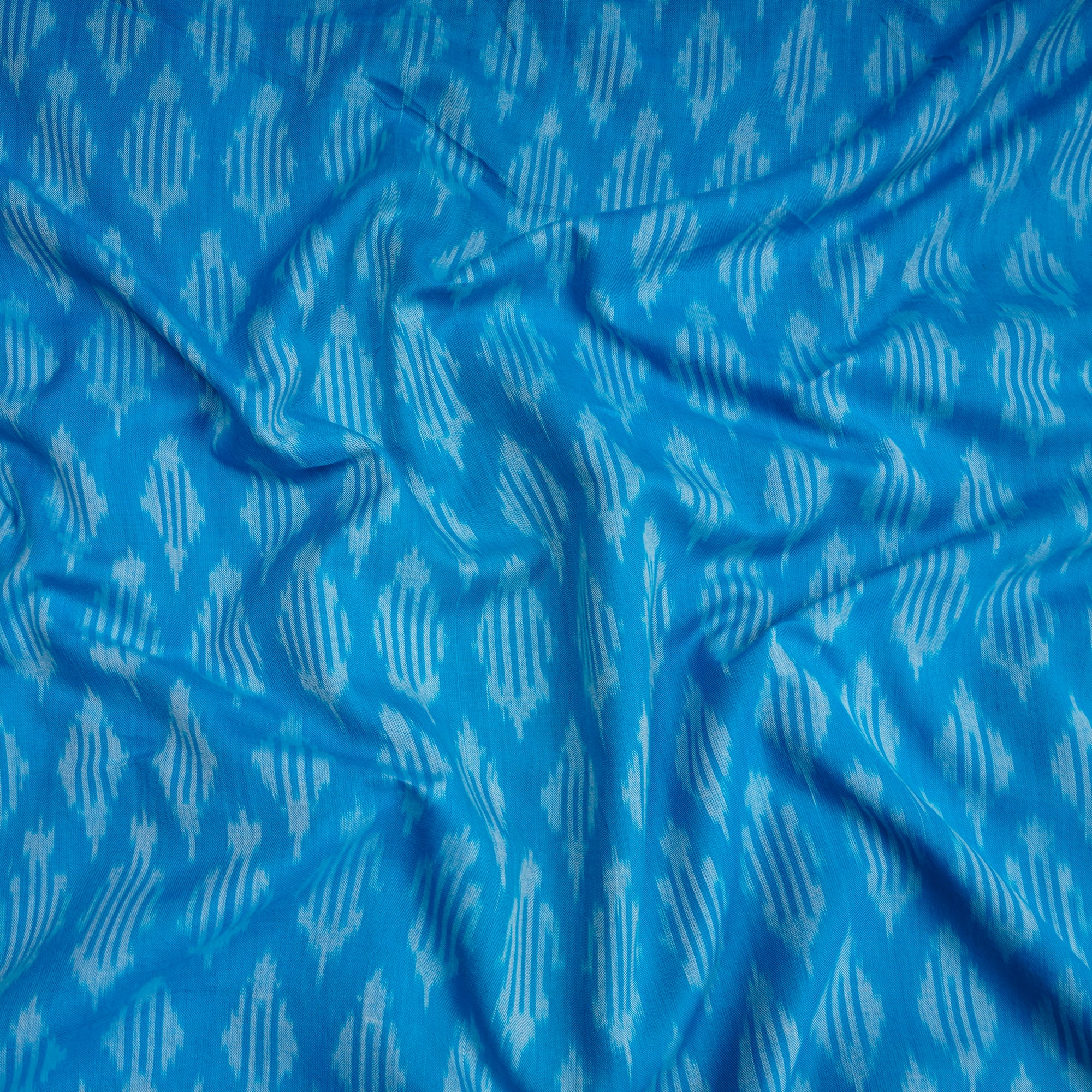 Light Blue Handwoven Mercerised Cotton Ikat Fabric (44" Width)