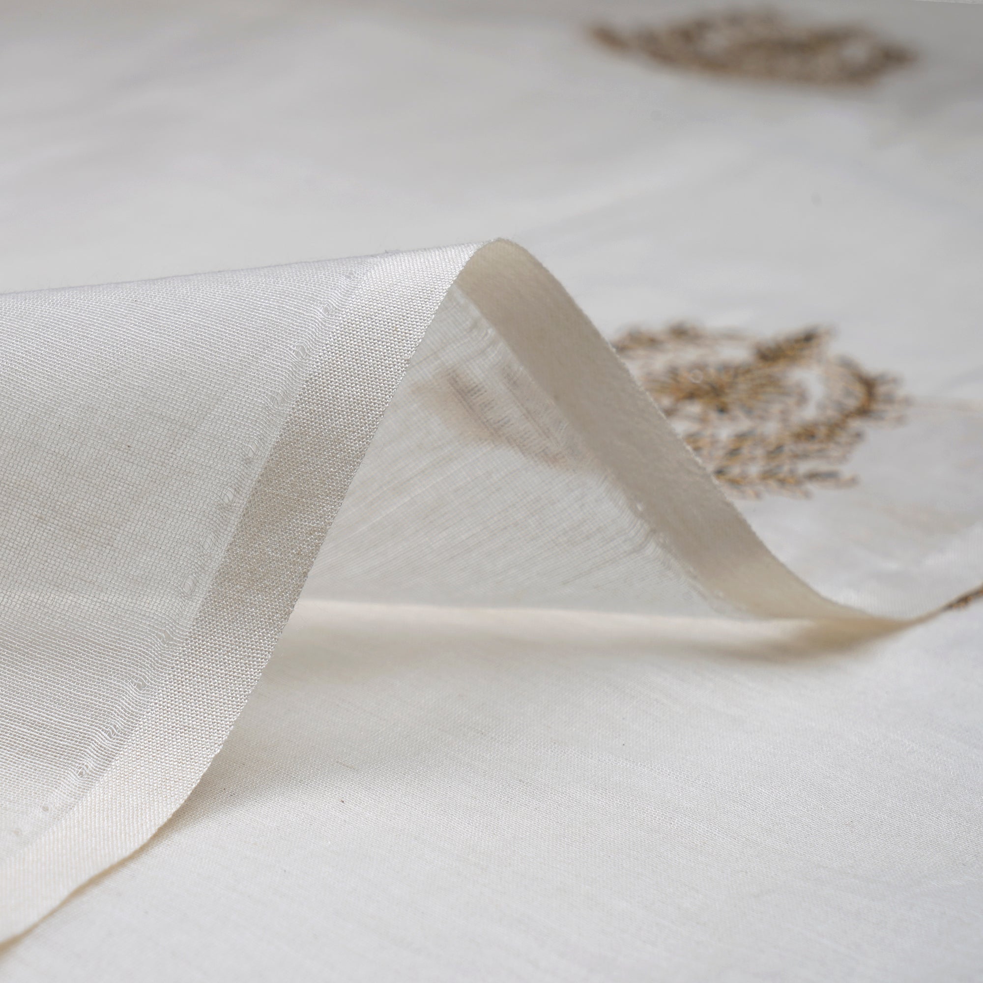 (Pre-Cut 2.50 Mtr)Off White Dyeable Motif Pattern Embroidered Chanderi Fabric