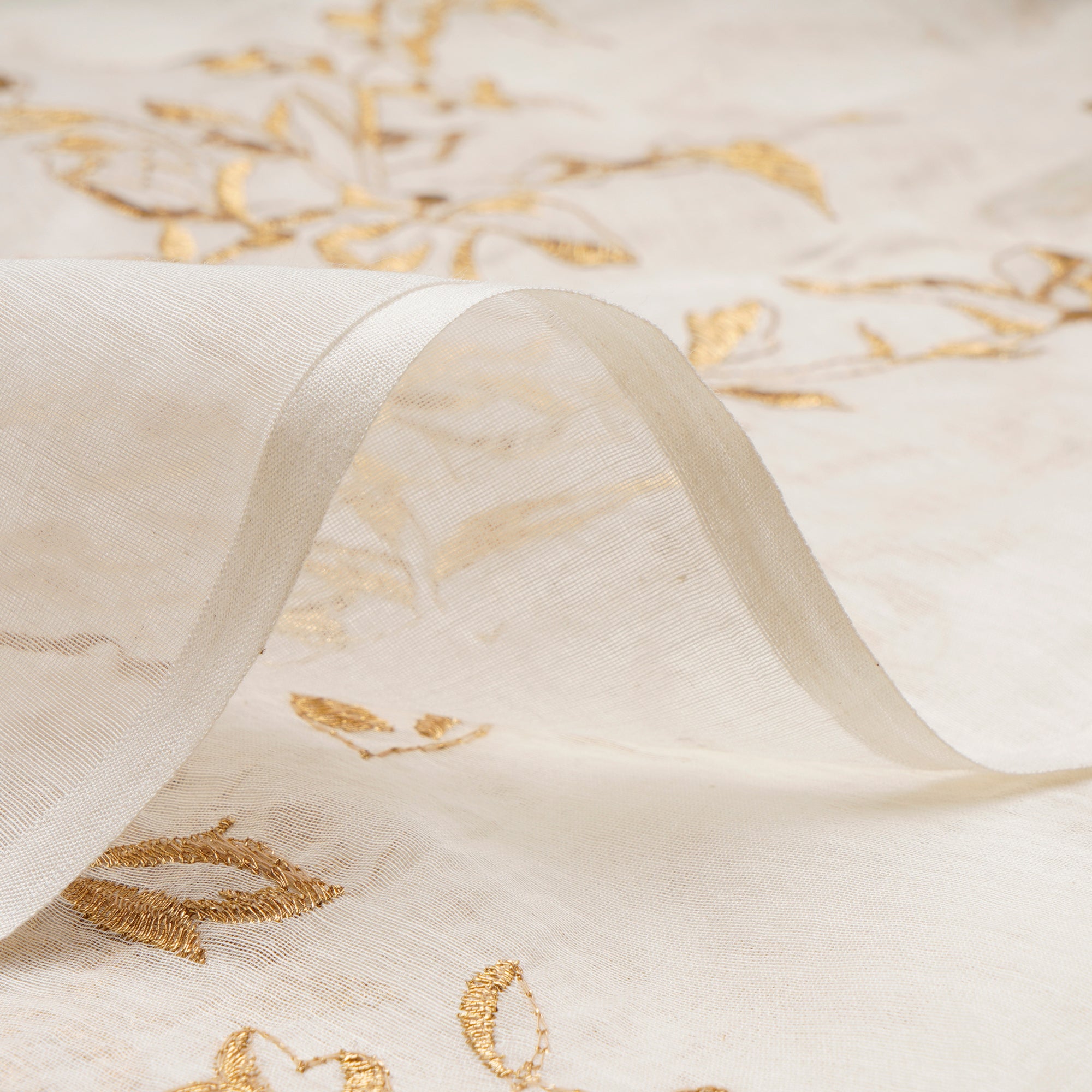 (Pre-Cut 0.50 Mtr)Off-White-Gold Dyeable All Over Floral Pattern Thread Embroidered Chanderi Fabric