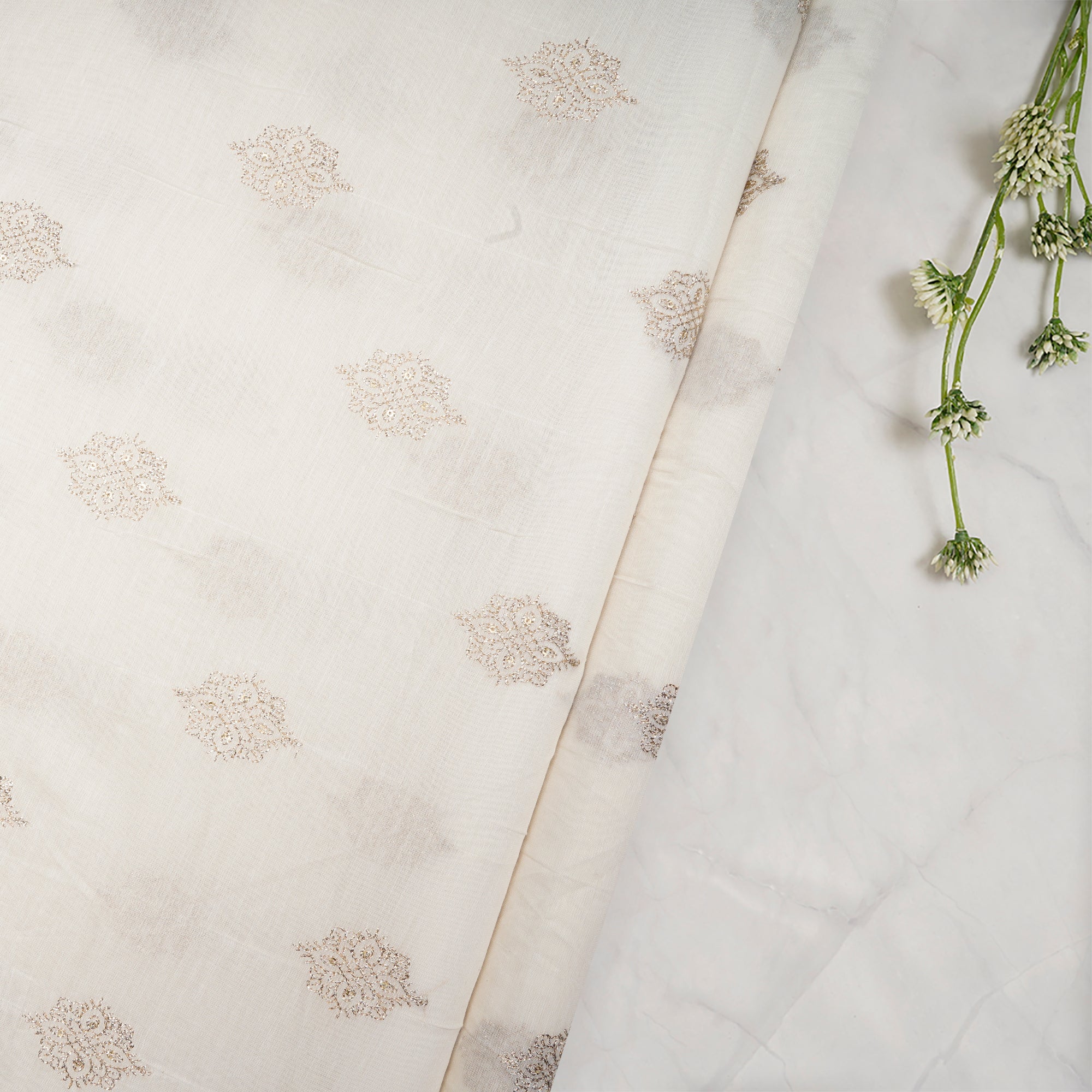 (Pre-Cut 0.60 Mtr)Off White Dyeable Motif Pattern Zari Embroidered Chanderi Fabric