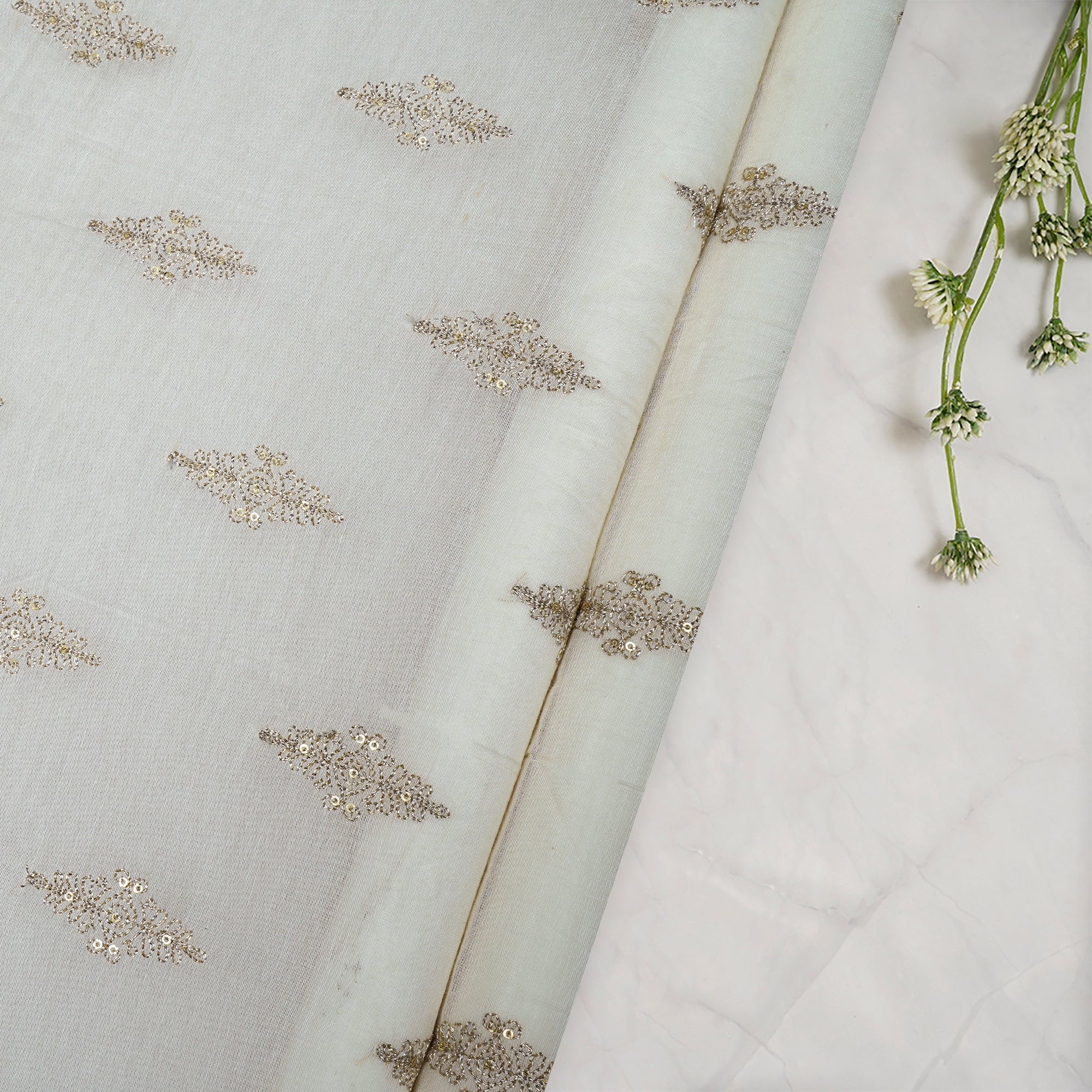 (Pre-Cut 0.70 Mtr)Off White Dyeable Booti Pattern Thread Embroidered Chanderi Fabric