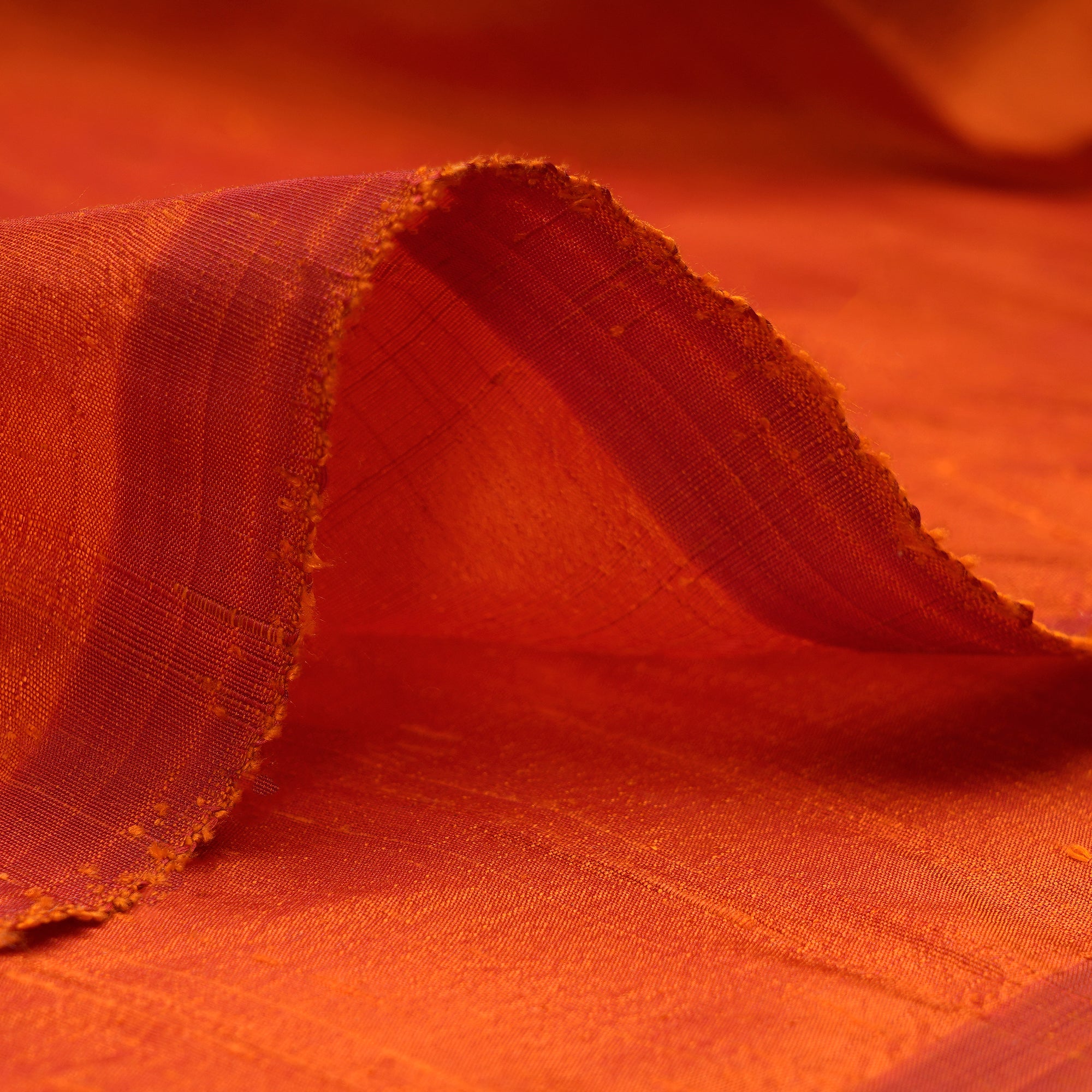 Orangeade Yarn Dyed Plain Blended Raw Silk Fabric