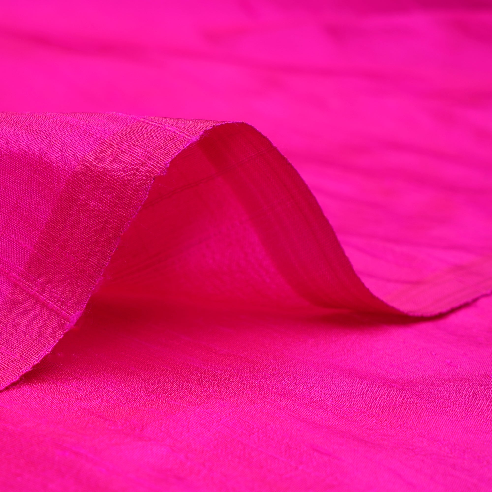 Rani Pink Yarn Dyed 90 GLM Blended Plain Raw Silk Fabric