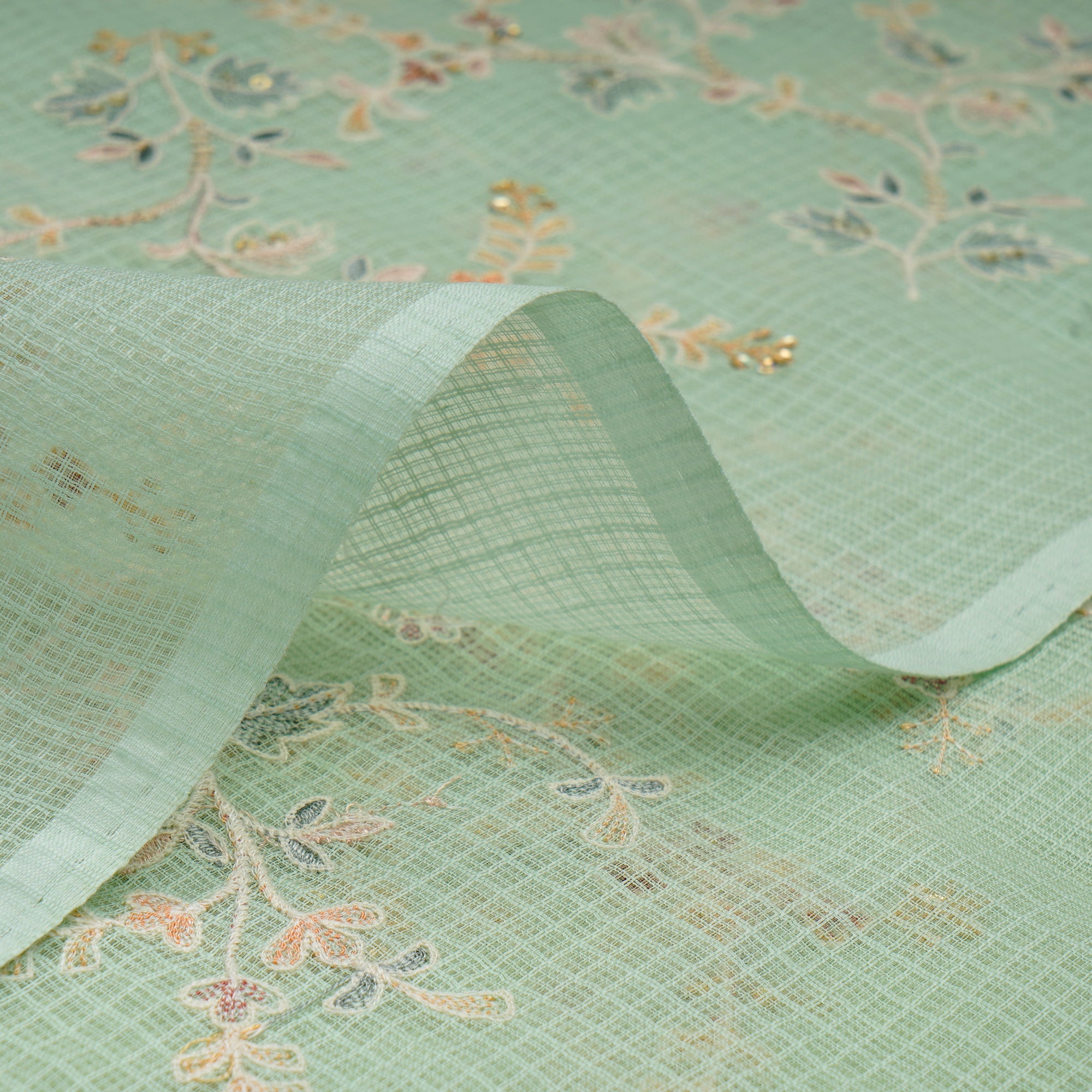 Pastel Green All Over Pattern Thread & Sequin Embroidered Cotton Kota Fabric