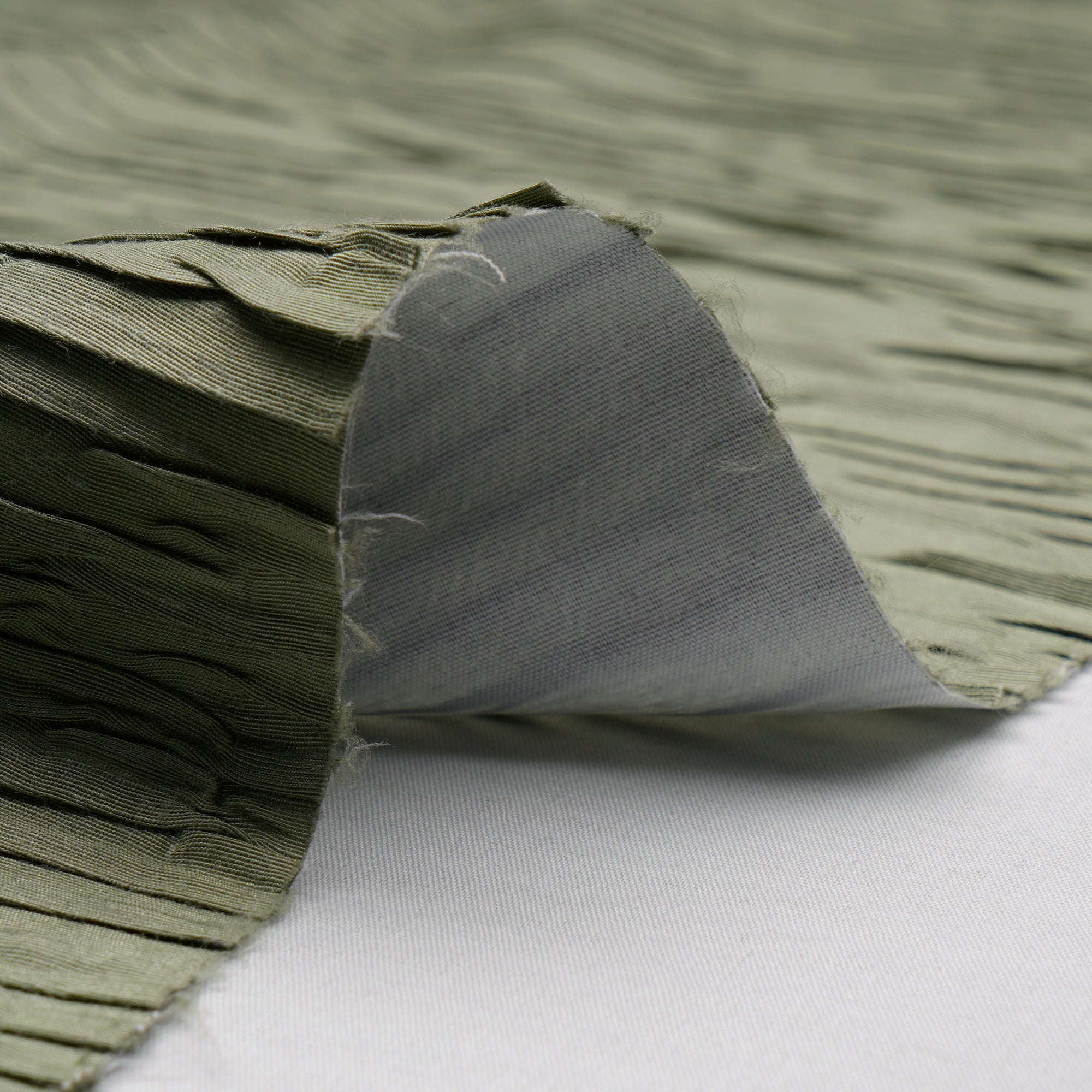(Pre Cut 2.20 Mtr Piece) Olive Color Value Added Pleated Bemberg Fabric With Back Pasting