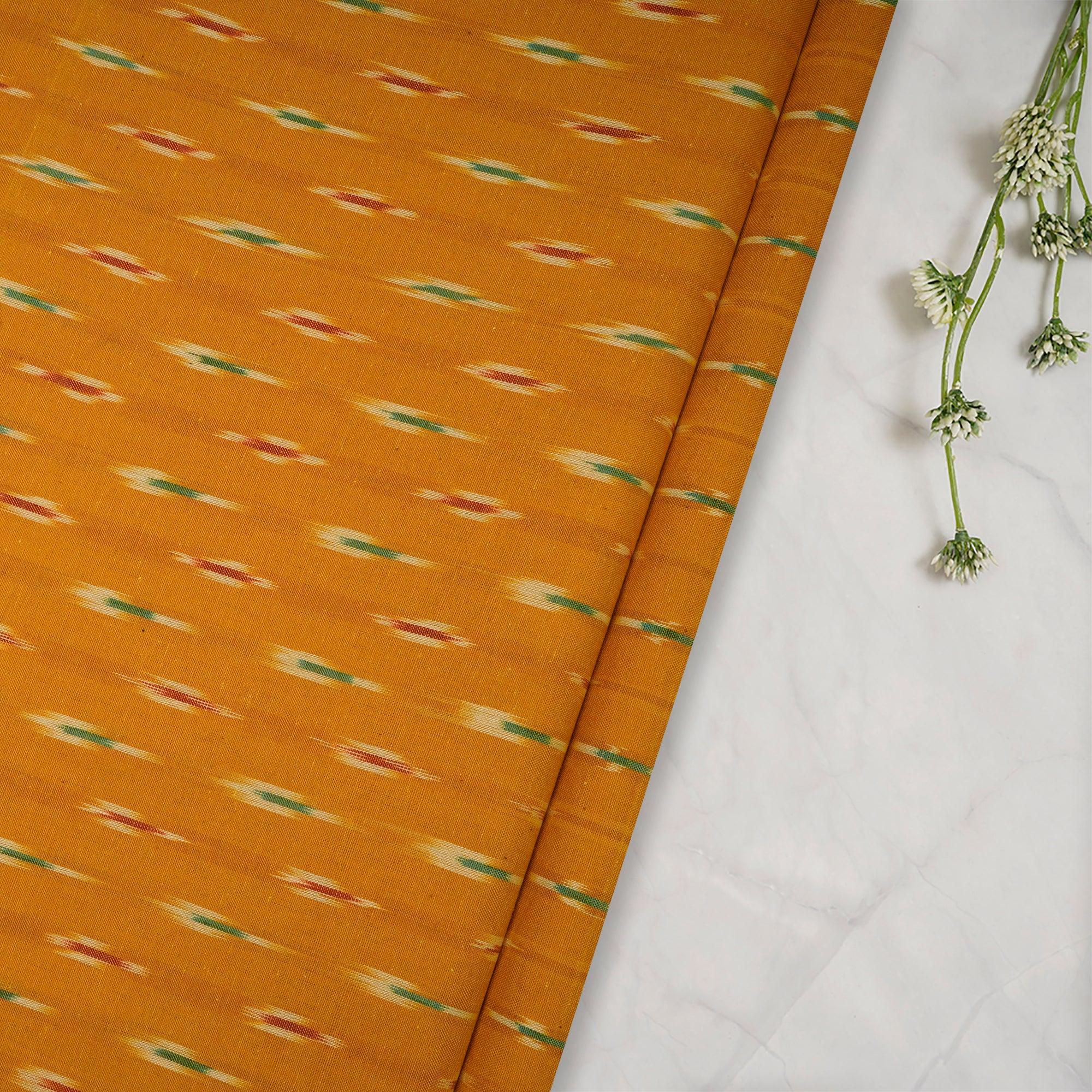 Yellowish Orange Washed Woven Ikat Cotton Fabric