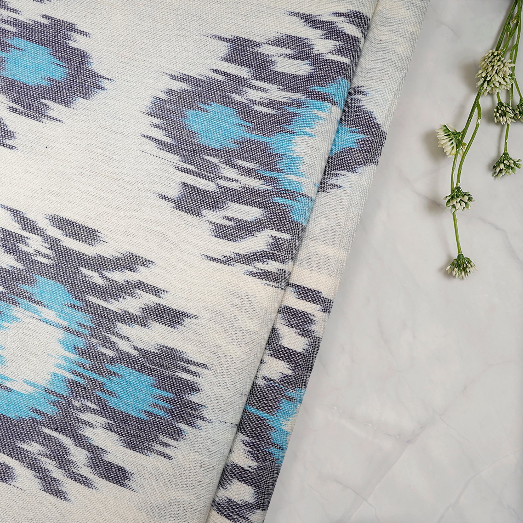 White-Blue Mercerized Washed Uzbek Motif Woven Ikat Cotton Fabric