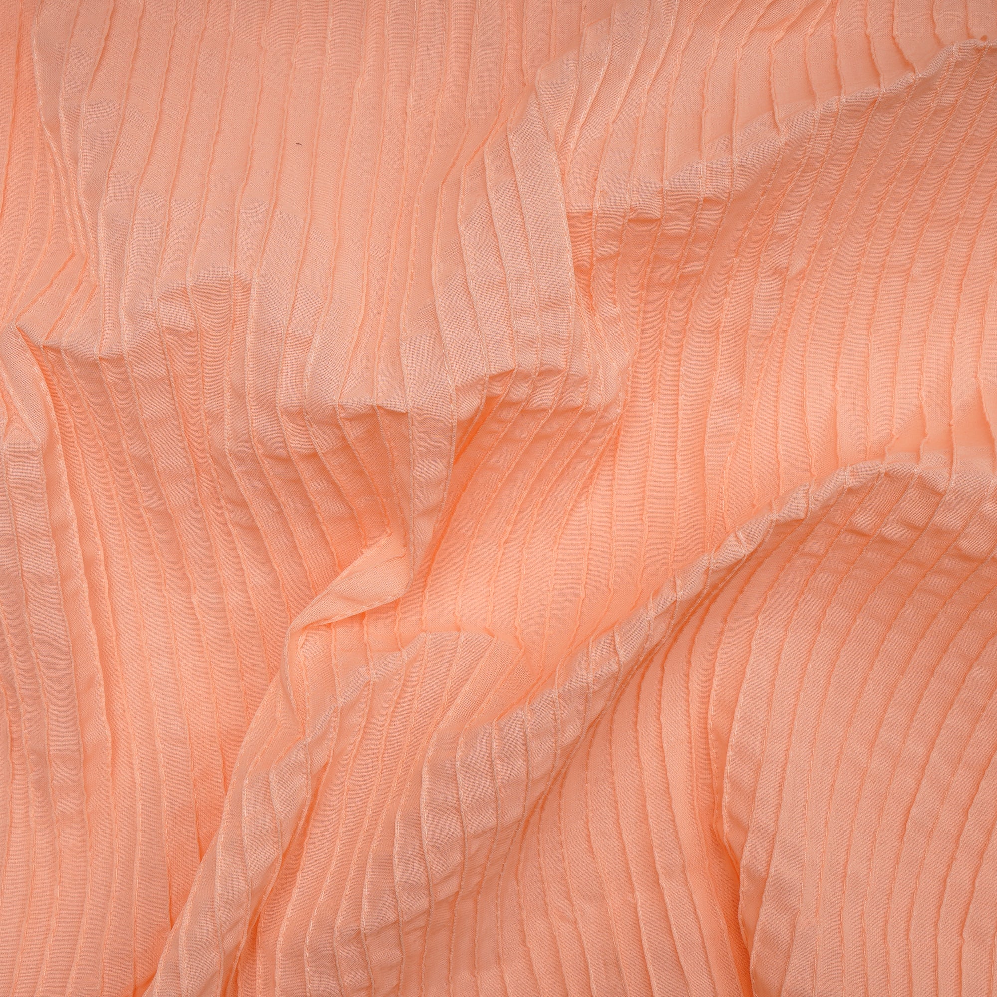 Peach Nectar Pintuck Pattern High Twist Cotton Voile Fabric