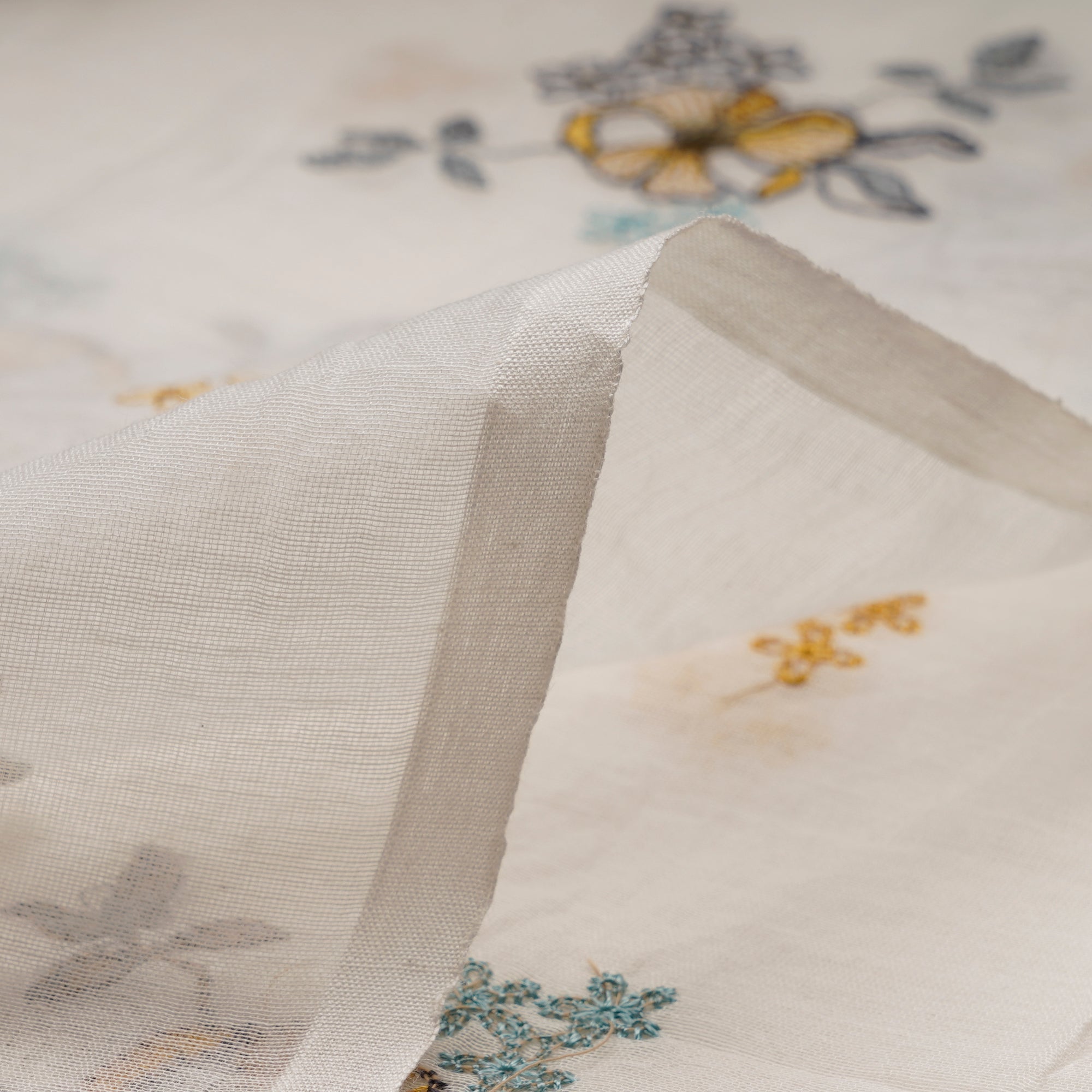 Off-White Floral Pattern Embroidered Chanderi Fabric